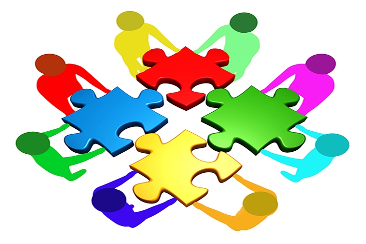 Dettaglio della locandina Dettaglio della locandina: individui stilizzati che mettono assieme pezzi di un puzzle