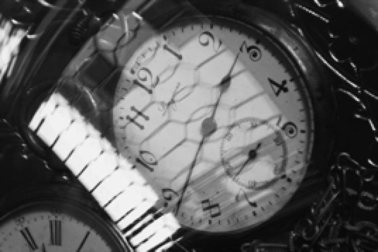 Dettaglio della locandina: immagine di un orologio