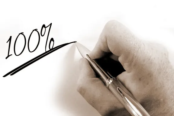 la scritta 100%